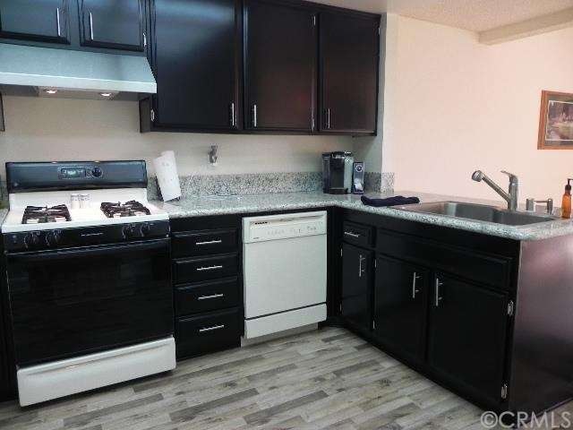 Remodeled kitchen with granite counters.  New sink