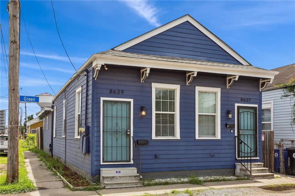 Front of building. Left side is the listed unit
