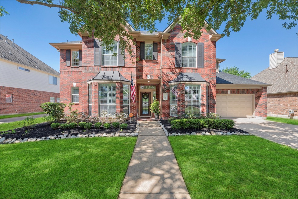 Welcome home to 26227 Longmont Park, nestled in th
