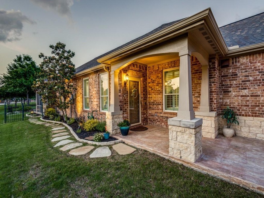 Beautifully landscaped entry.
