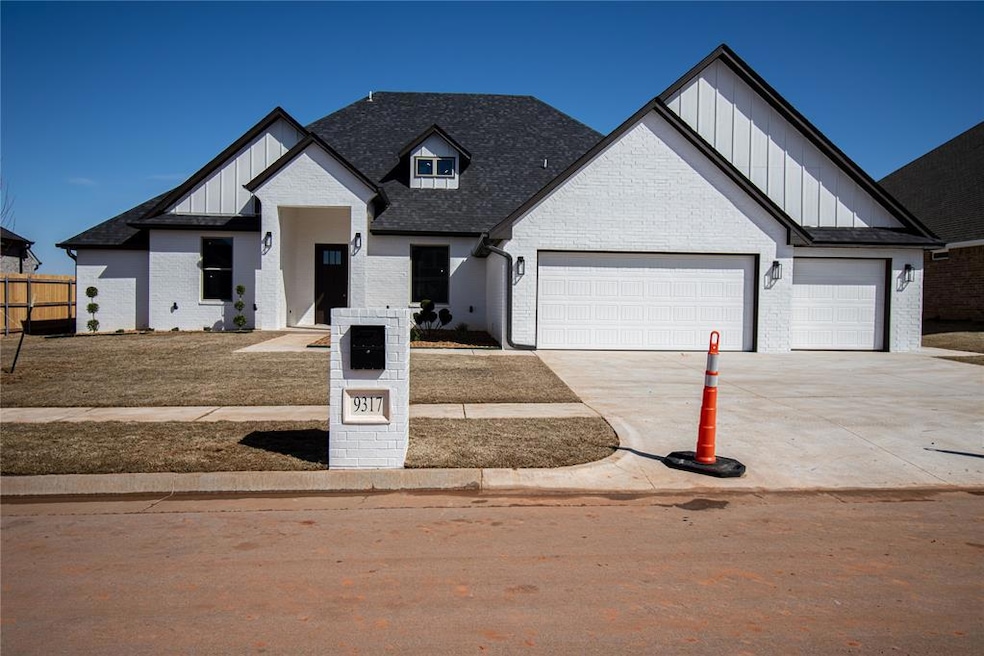 Modern farmhouse featuring a garage