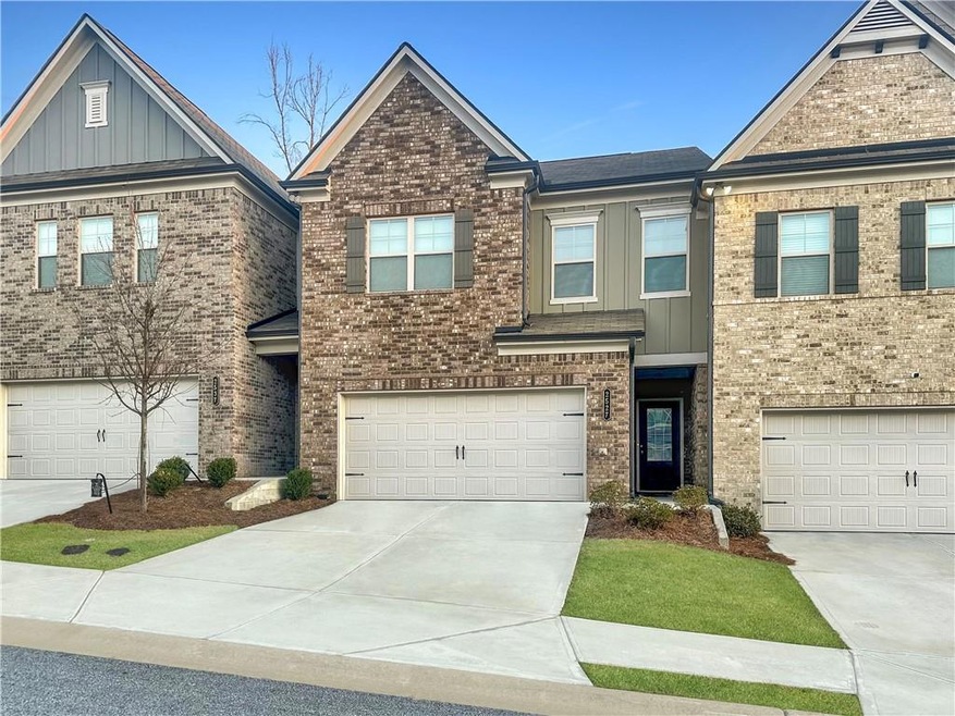 View of front of property featuring a garage