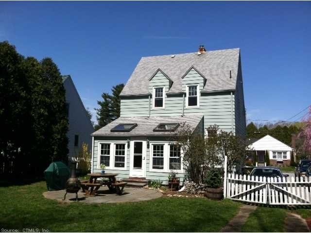 Exterior Back. Large back yard with gardens backs 