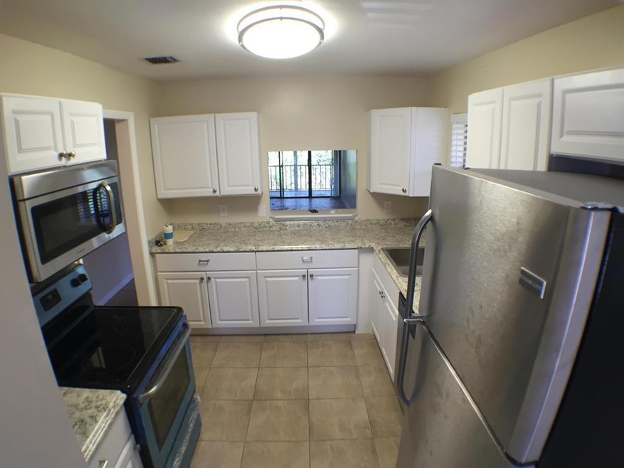 5937 Forest Hill Blvd unit 206, West Palm Beach, FL 33415 - photo 1