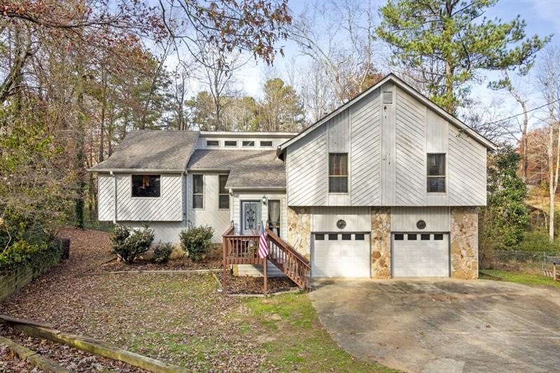 Welcome home to 1655 Cedar Grove Drive, Marietta.