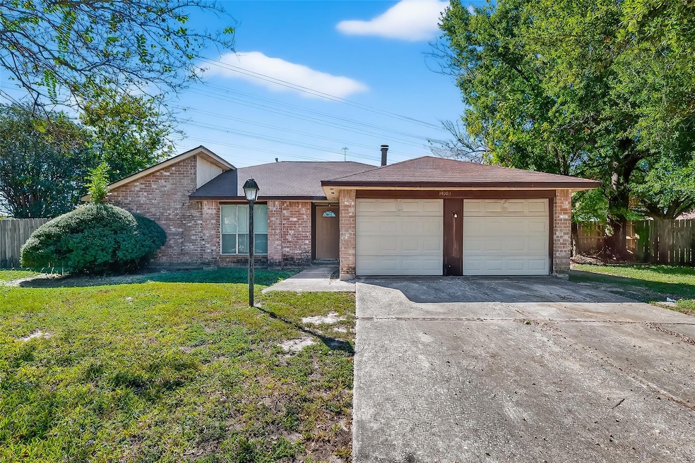 View of front of house featuring brick siding, concrete driveway, roof with shingles, and an attached garage