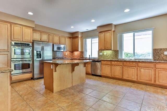 Kitchen with Granite Slab Counters