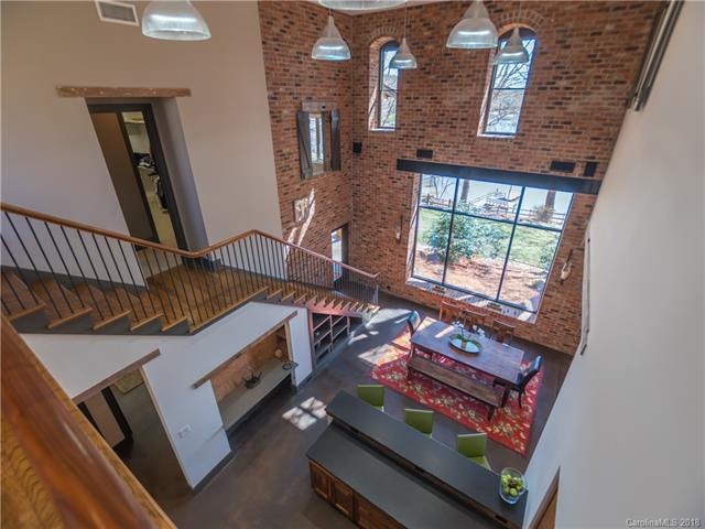 Large windows bring sunlight and lake views into t
