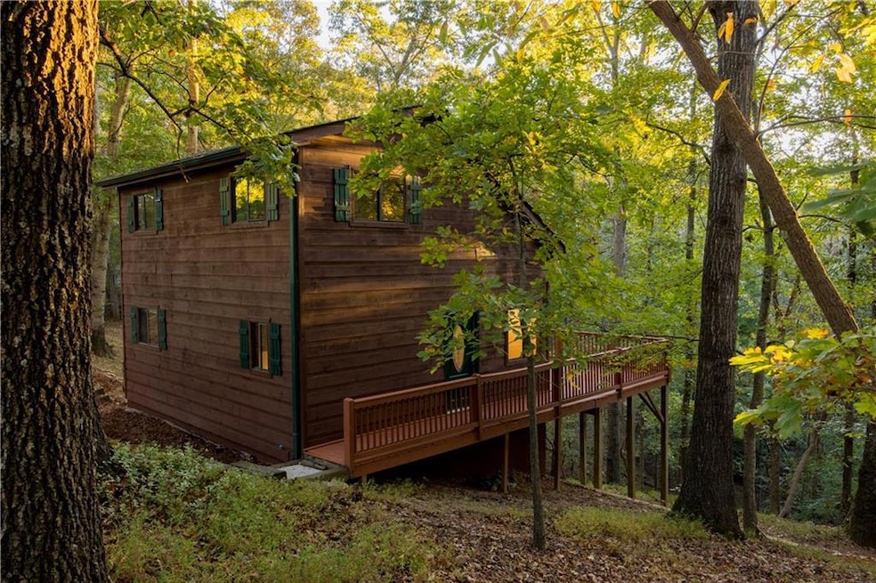 View of property exterior featuring the front door