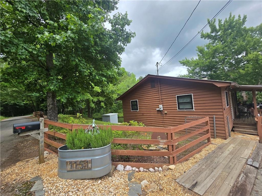 View of home's exterior with a deck