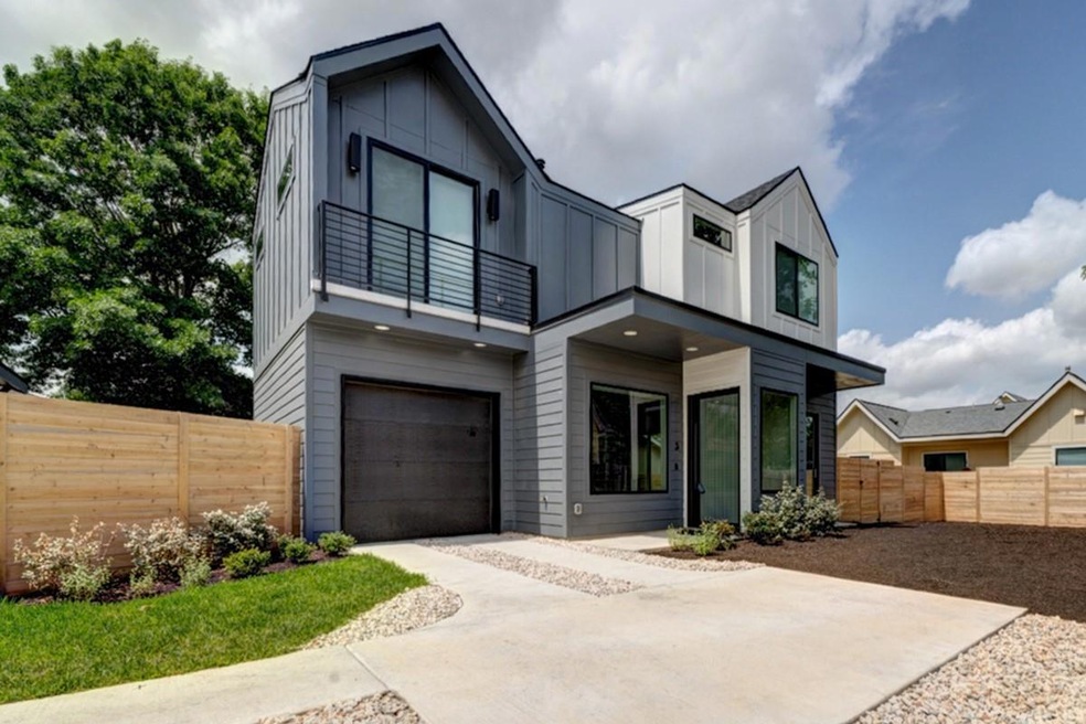 View of front of property with board and batten s