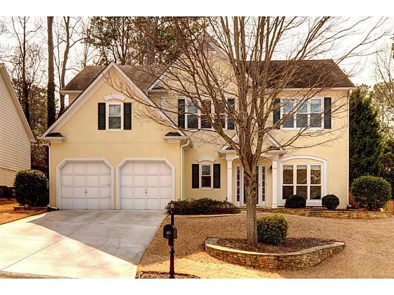 Exterior Front. New concrete driveway and flagston