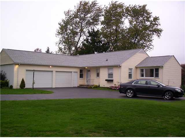 Exterior Front Extra Large 3 Car attached Garage!