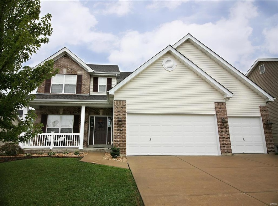 Upgraded elevation w/ porch, brick & a 3-car garag