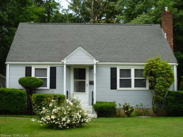 Exterior Front. Picture perfect front yard. Well m
