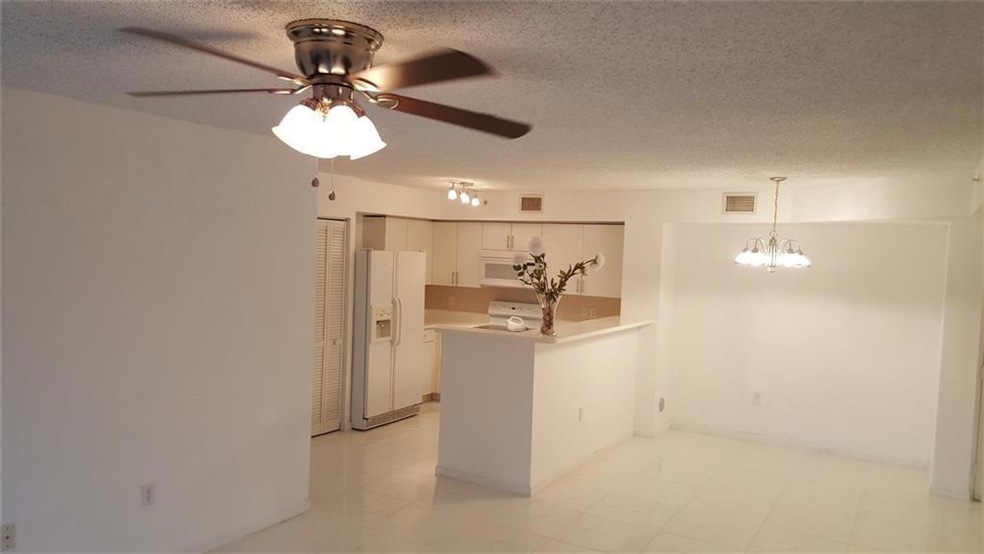 4856 N State Road 7 unit 103, Coconut Creek, FL 33073 - photo 1