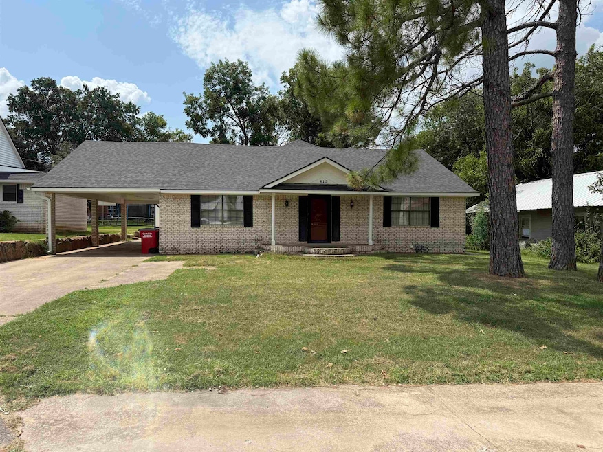 413 E Harper Ave, Waurika, OK 73573 - photo 1