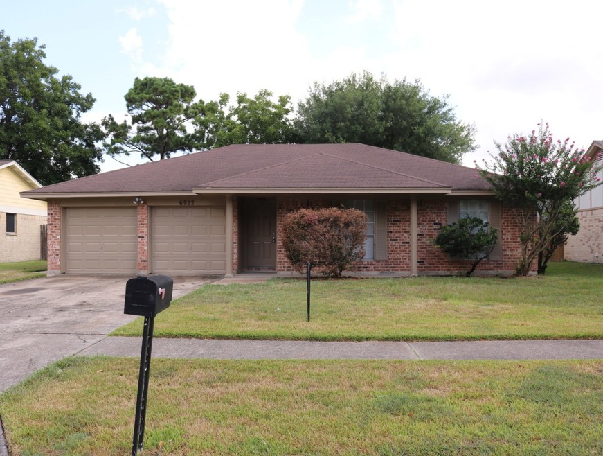 6922 Winding Trace Dr, Houston, TX 77086 - photo 1