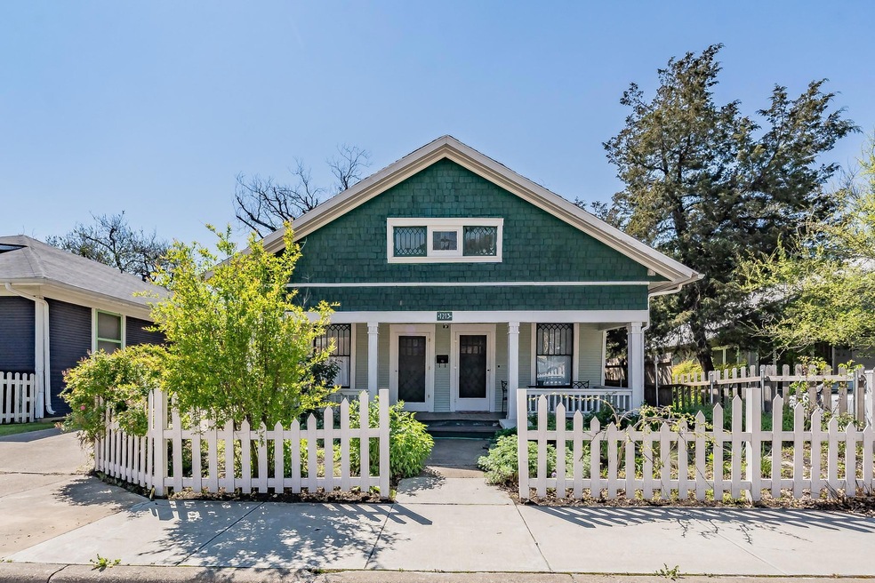 View of front of home featuring a beautiful covere
