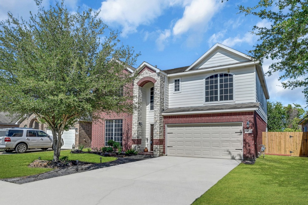 Extended driveway with two car attached garage