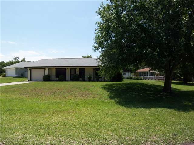 Exterior Front. over sized corner lot, bring boat