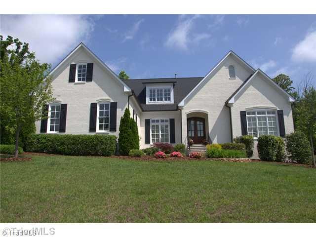 Exterior Front. Elegant European Country  All Brick Exterior. Professionally landscaped with irrigation system.