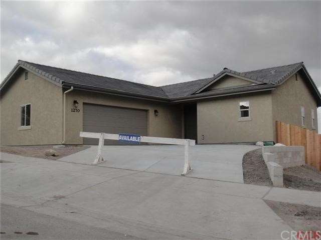 Front elevation. Front yard landscaping going in w