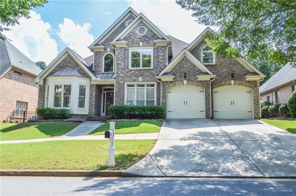 Craftsman-style home featuring a front yard and a 