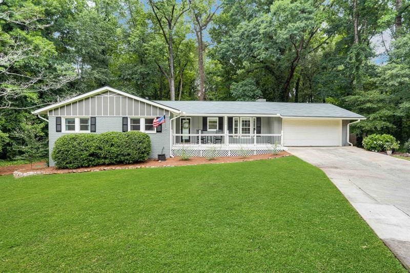 Welcome home to this charming brick ranch on a cul