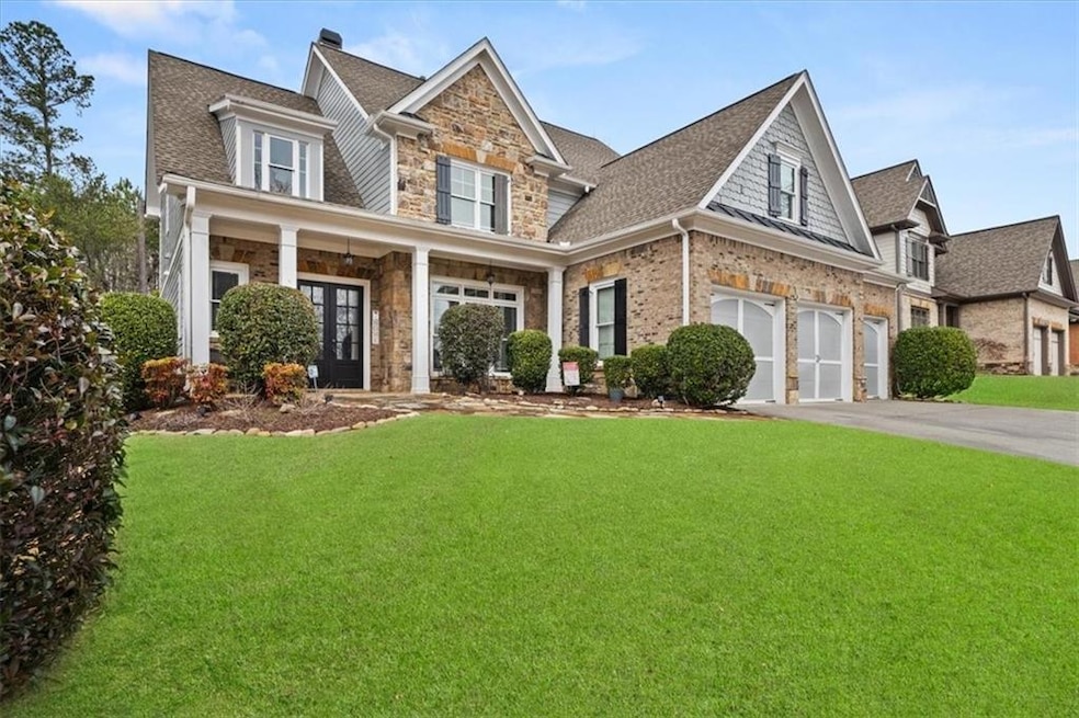 View of front of house featuring a garage, a front