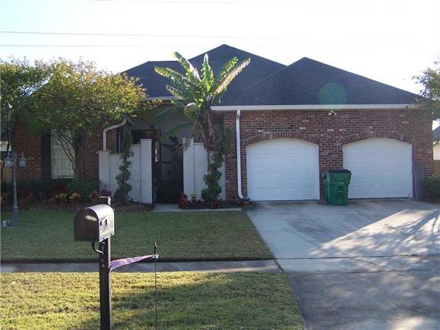 Photo. FRONT OF THIS CUSTOM BUILT HOME...