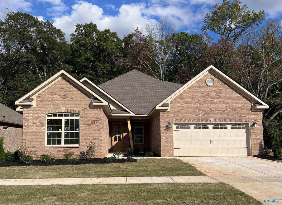 Under Construction - 3-bedroom, 3.5-bathroom Homewood Grand Cottage features a spacious bonus room..  The open floor plan flows into a dream kitchen with a large island and walk-in pantry. Nestled against a serene wooded backdrop. Serenity Abounds!!