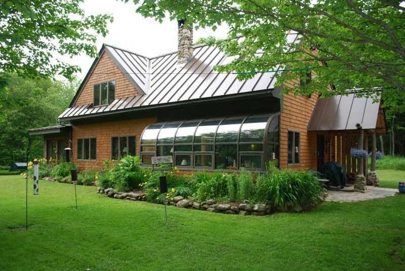 Exterior Front. Custom post and beam...