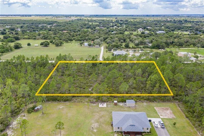 2.5 acres of heaven in Charlotte Ranchettes. Acces