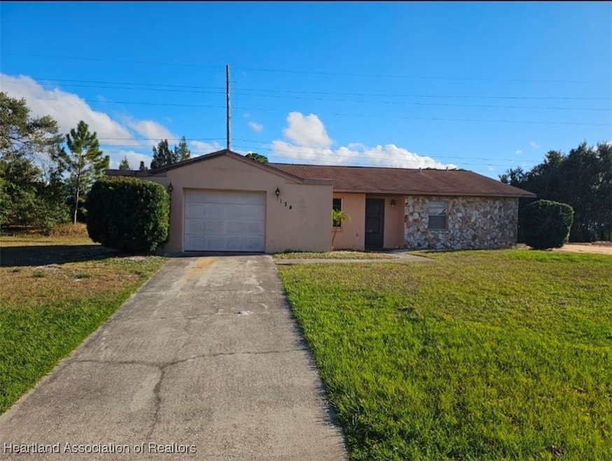 138 Friendly Cir, Sebring, FL 33876 - photo 1