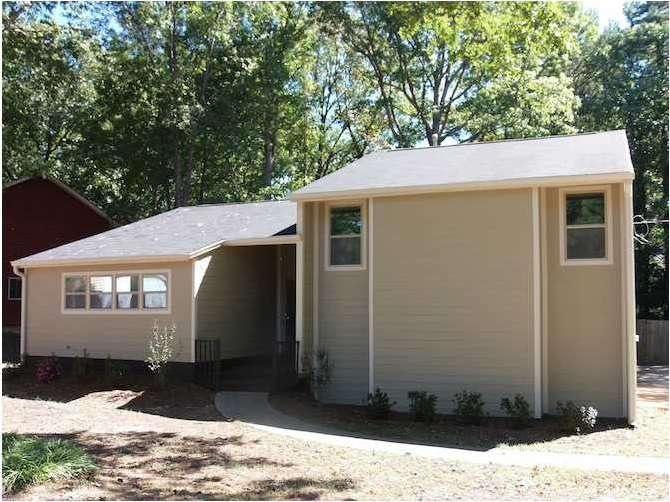 Exterior Front. Brand New Wood- Cement Siding!