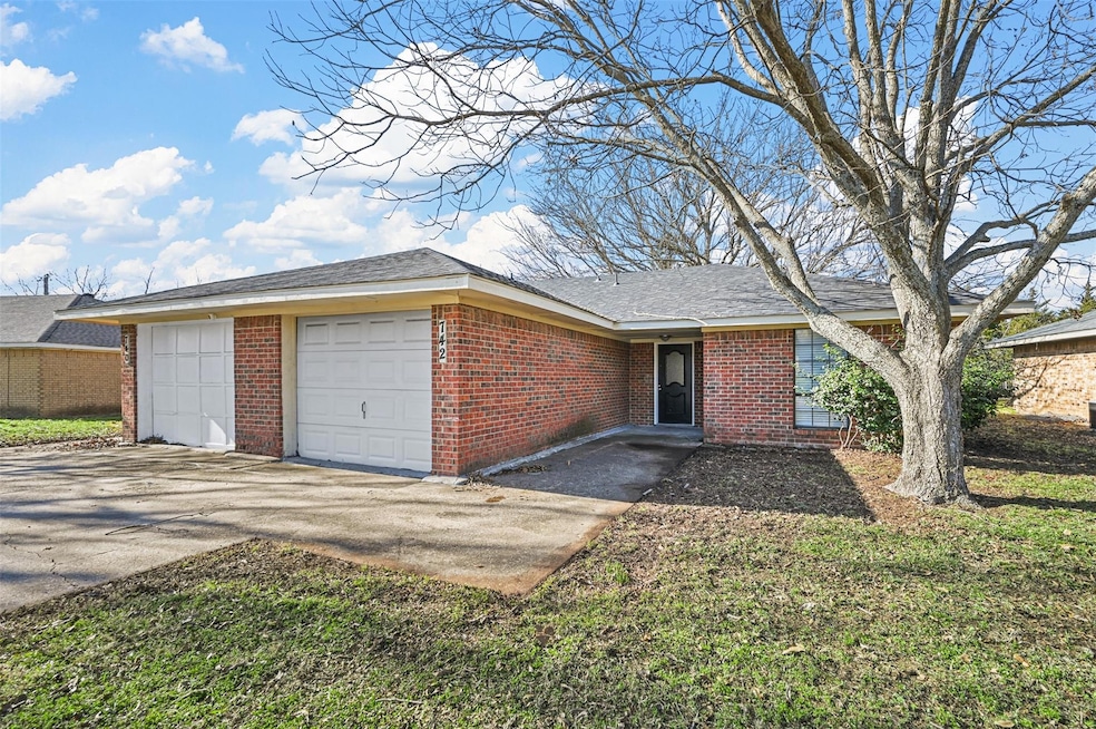Single story home with a garage