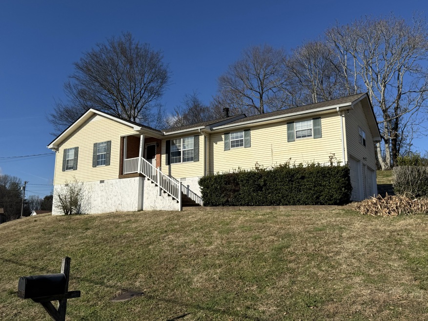Property sits up and flattens in the back and side yard.