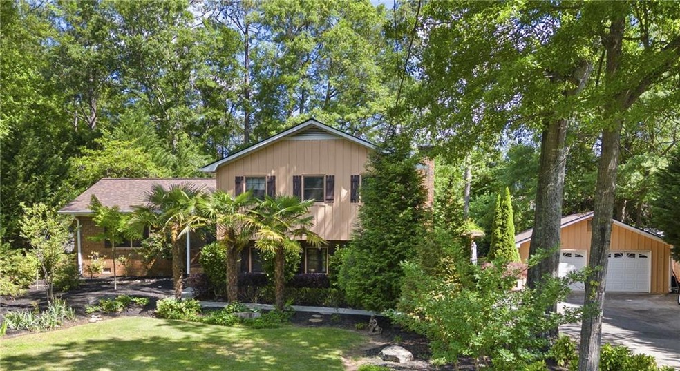 View of front of home featuring a garage and a fro