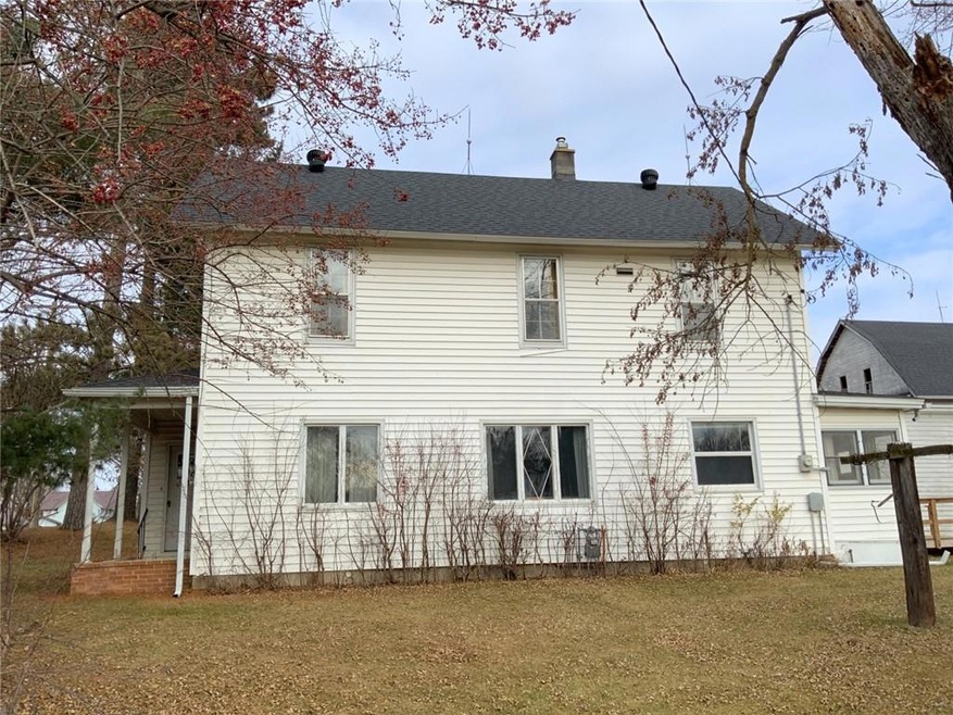 Side view of home with front to left. Corner Lot.