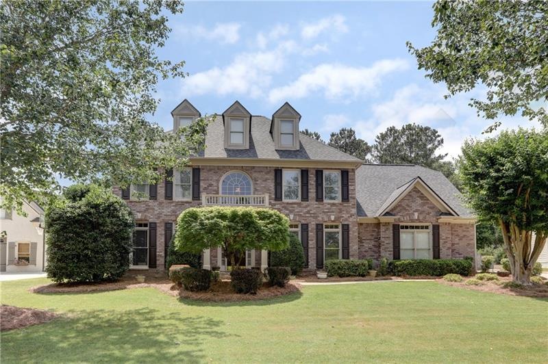 Stunning brick front home on a well maintained, le