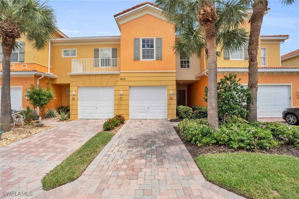 View of front of property featuring a balcony and