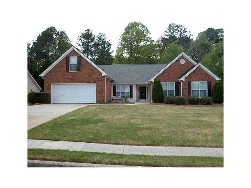 Exterior Front. Wide level drive way.  This home b