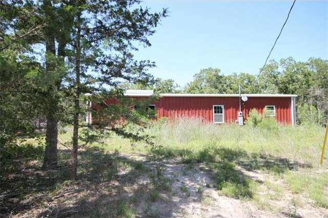 Super nice metal building on 10+ wooded acres*Powe