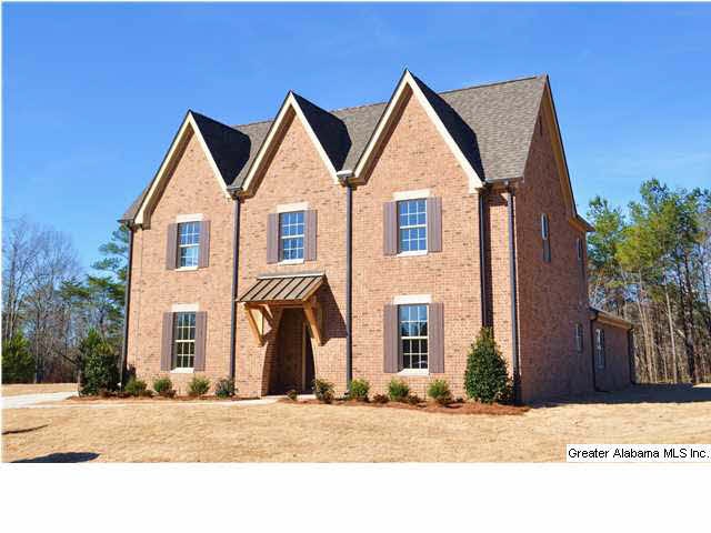 Stunning two story Old English style 3 car garage 