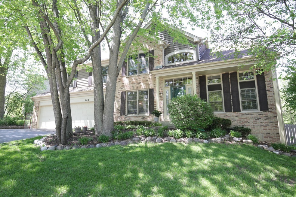 Brick front with 3-car garage and additional brick