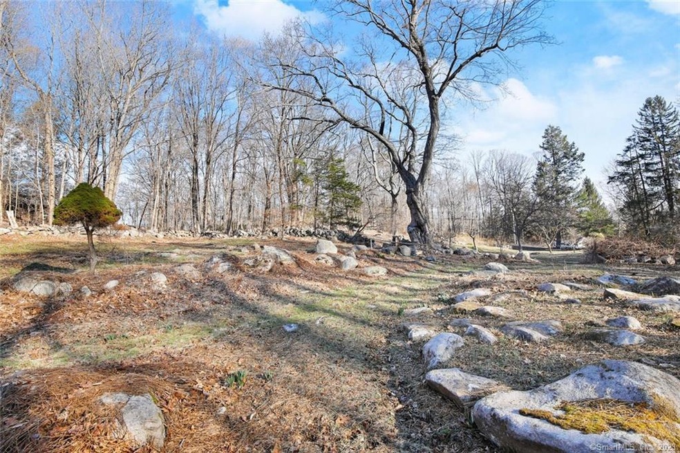 This gorgeous 2 acre lot is cleared and ready for 