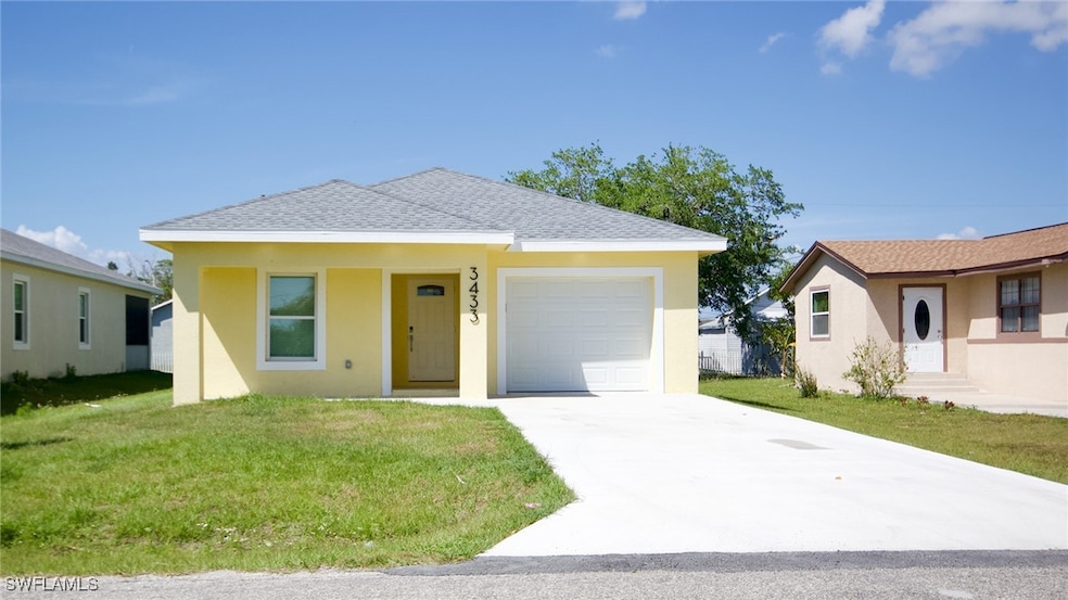 View of front of property featuring stucco siding,