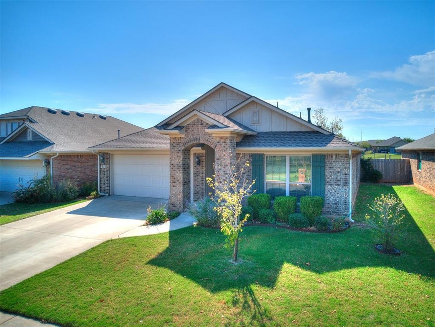 View of front of property with a front yard and a 