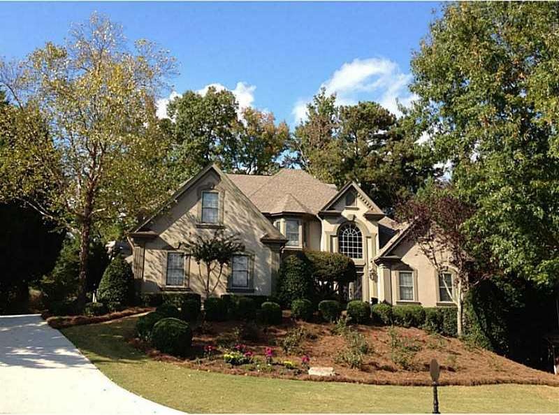 Exterior Front. Fabulous HARDCOAT stucco on Hole 1